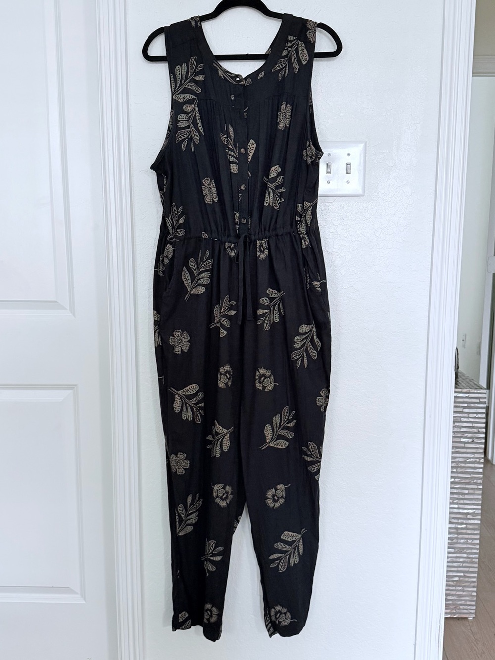 Sleeveless Black Floral Print Jumpsuit with Tie Waist